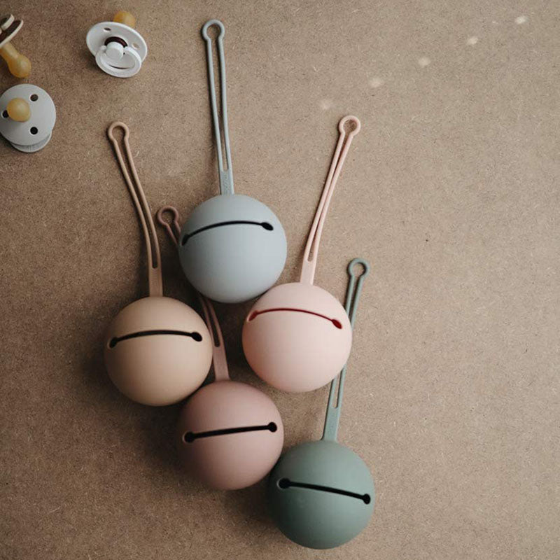 Mushie® Torbica za dudo Shifting Sand Mushie