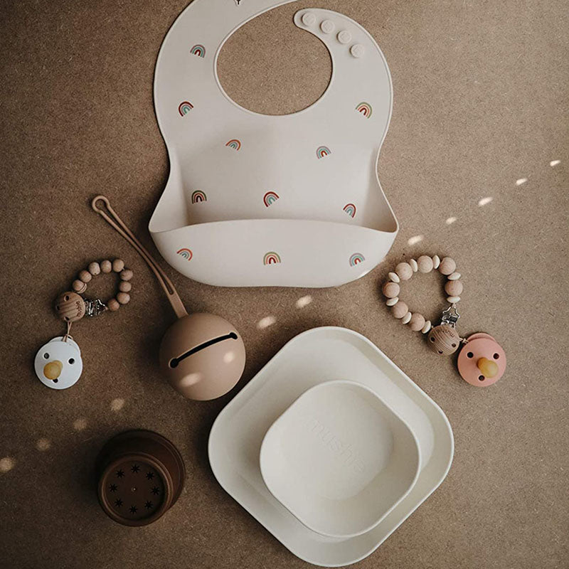 Mushie® Torbica za dudo Shifting Sand Mushie