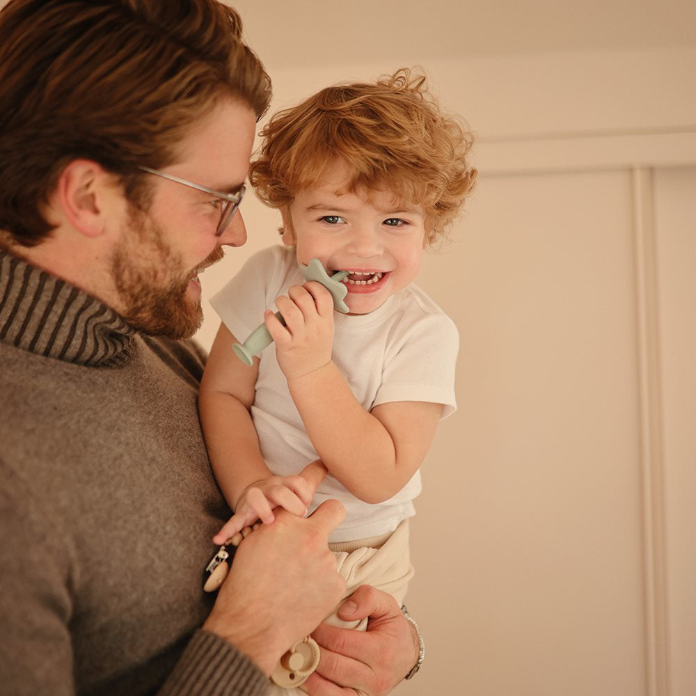 Mushie® Silikonska zobna ščetka Blush Mushie