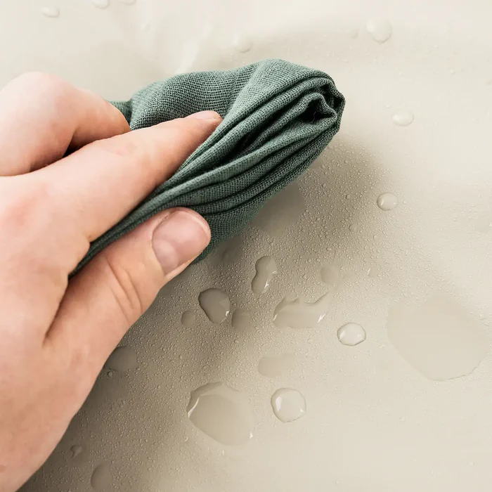 Done by Deer® Prenosna previjalna podloga Sand Done by Deer