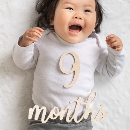 Picture of Pearhead® Wooden Baby Milestone Numbers and Words Photo Props